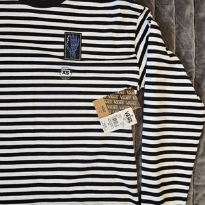 Vans. Black & white stripe LS w/ blue skeleton hand. Xx.